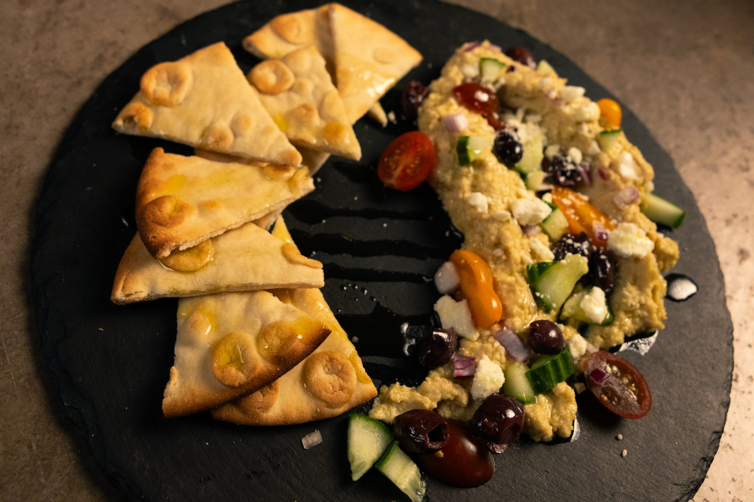 Hummus plate with warm pita