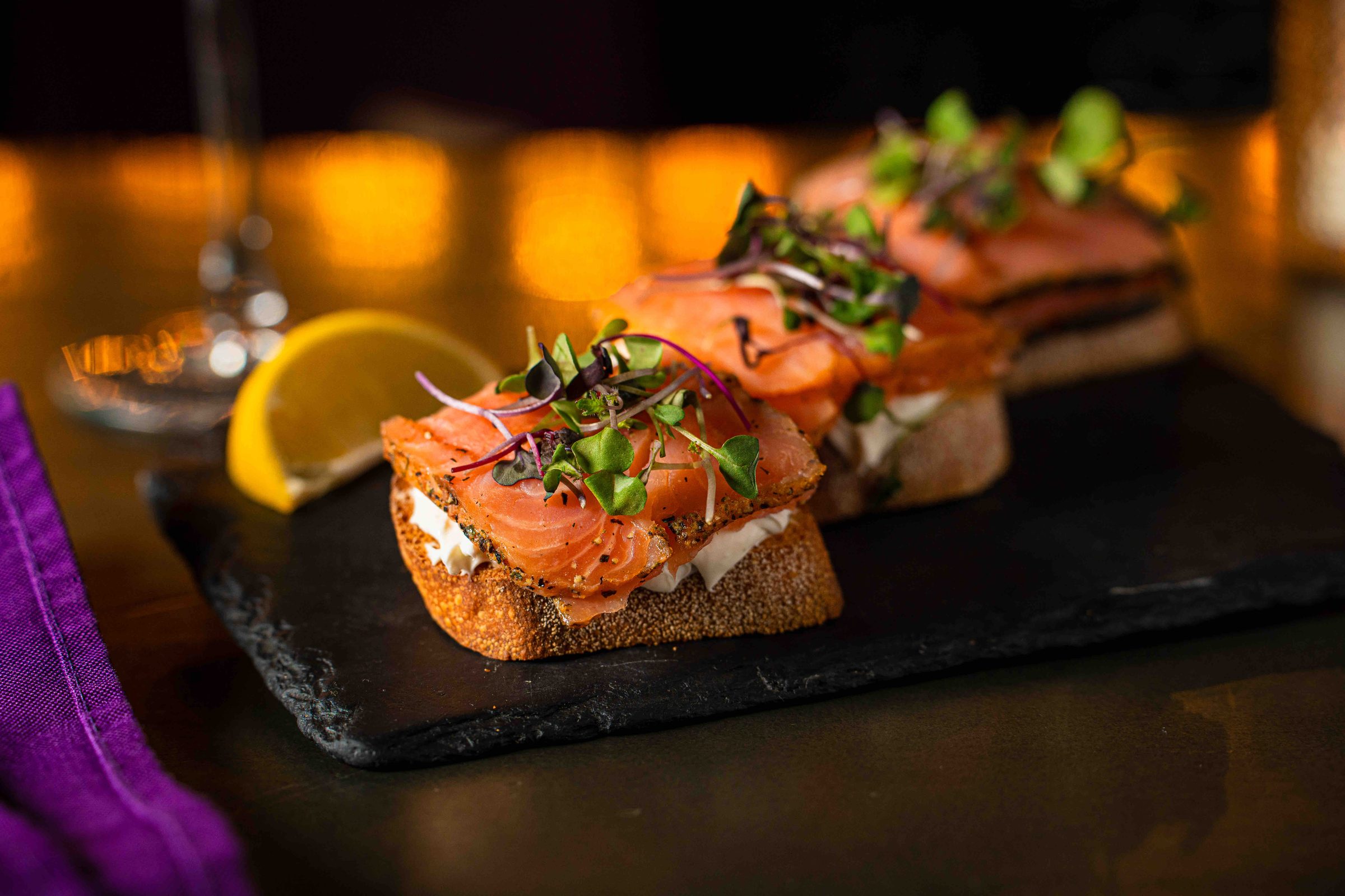 Smoked salmon toasts with microgreens